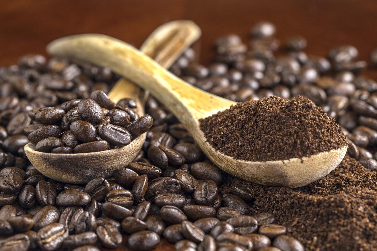 Close up photo of coffee beans and grounds