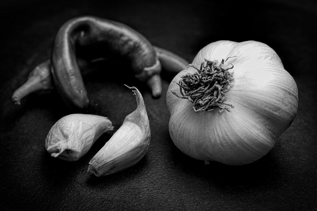 Still life of garlic and peppers