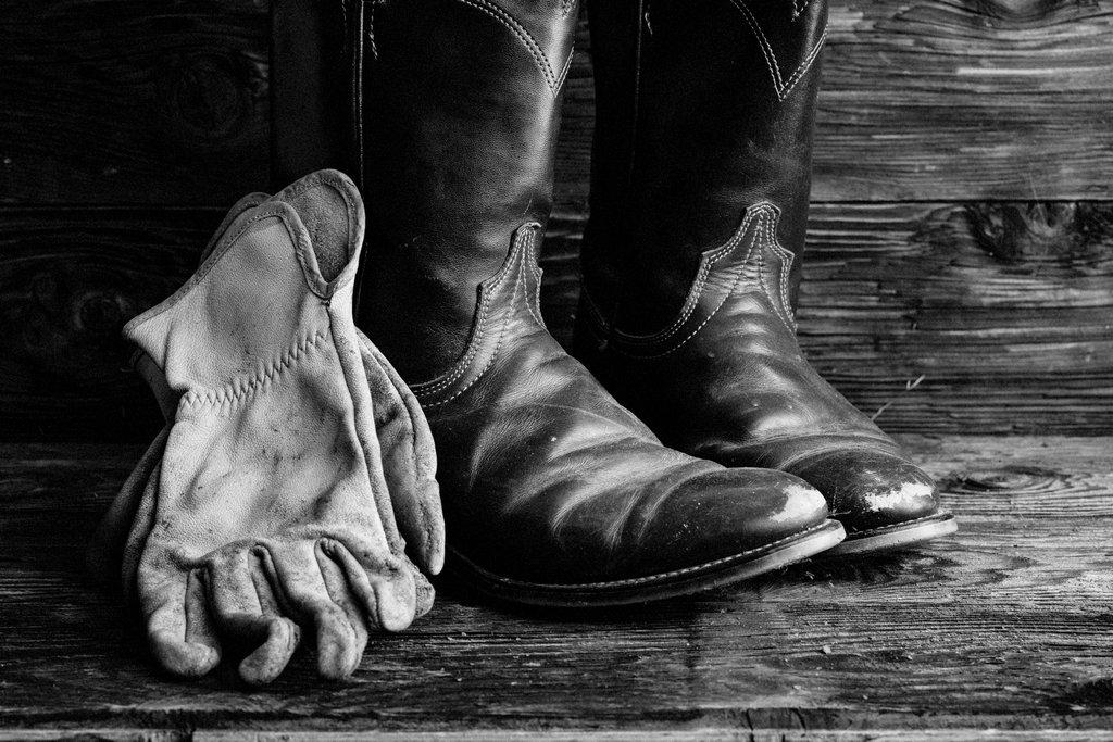 Leather cowboy boots and gloves